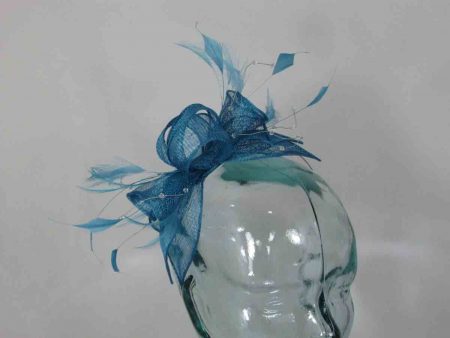 Double flower fascinator in turqouise