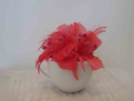Feathered fascinator in flamingo pink