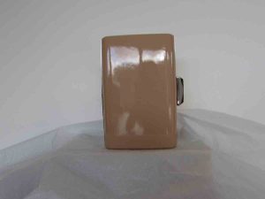 Patent clutch bag in nude