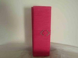 Silk clutch bag in Calypso