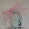 Crin fascinator with spots in dusky pink