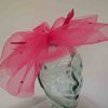 Crin fascinator with spots in hot pink