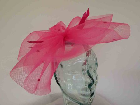 Crin fascinator with spots in hot pink