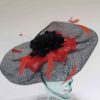 Wavy 2 colour fascinator in navy and orange