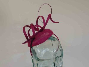 Pillbox fascinator with sinamay swirls in fuchsia pink