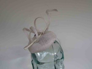 Pillbox fascinator with sinamay swirls in white