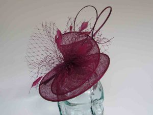 Sinamay swirl fascinator in berry