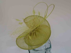 Sinamay swirl fascinator in citrus lime