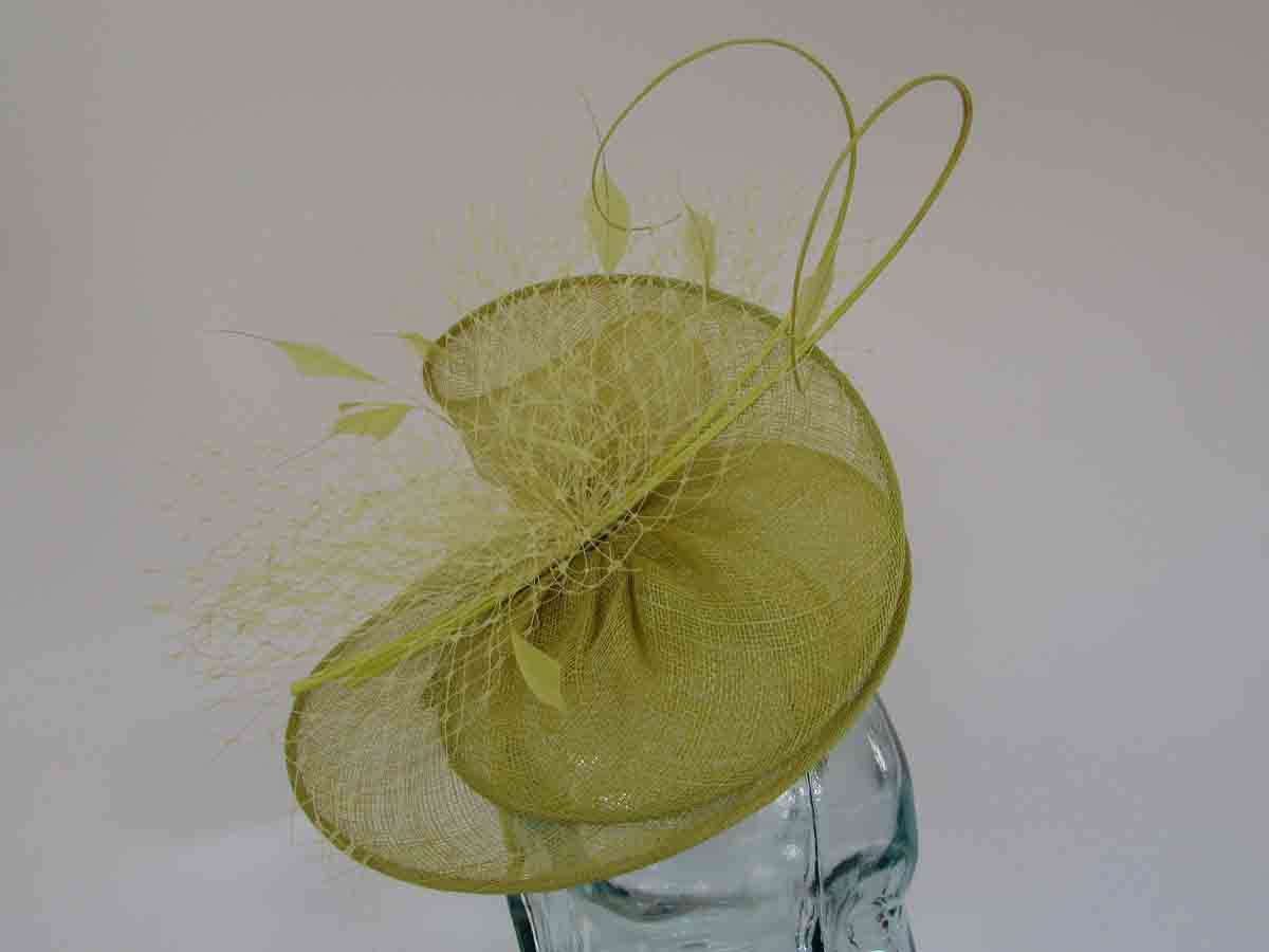 Sinamay swirl fascinator in citrus lime