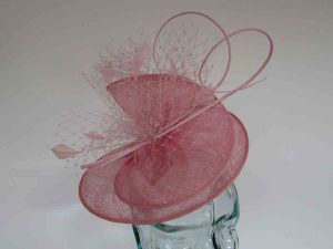 Sinamay swirl fascinator in confetti pink