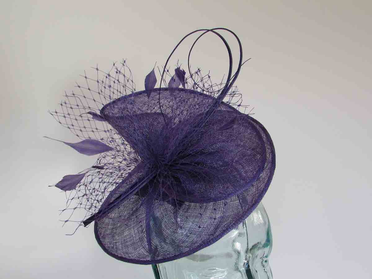 Sinamay swirl fascinator in pansy purple