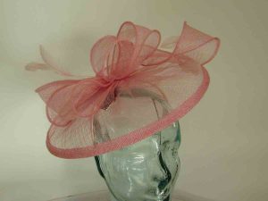 Sinamay fascinator with feathers in confetti pink