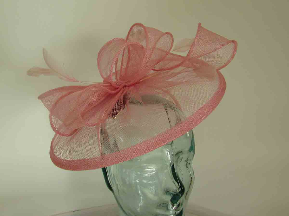 Sinamay fascinator with feathers in confetti pink