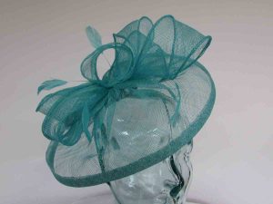 Sinamay fascinator with feathers in lido blue
