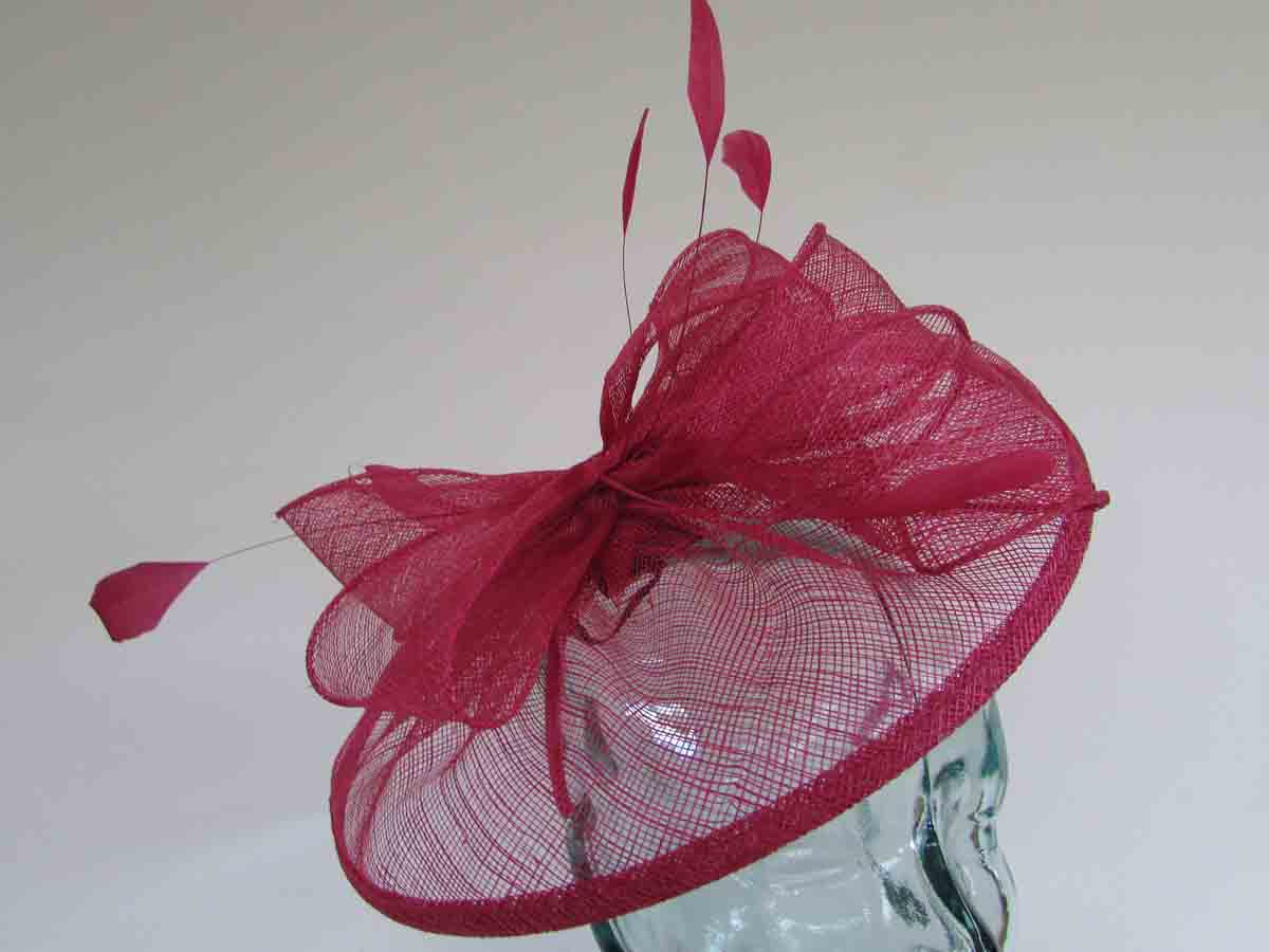 Sinamay fascinator with feathers in Samba pink