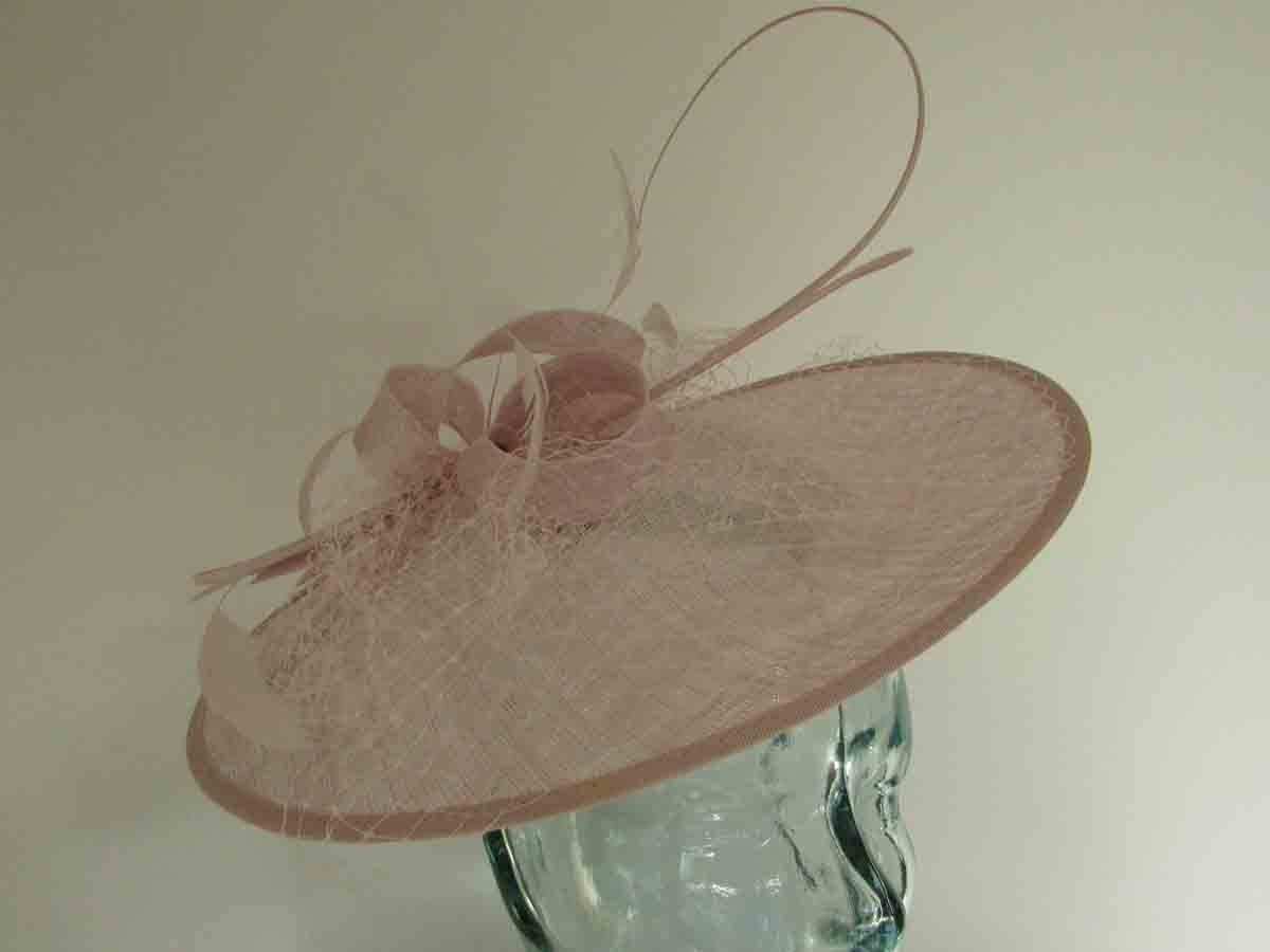 Circular hatinator with sinamay bow in mist lilac