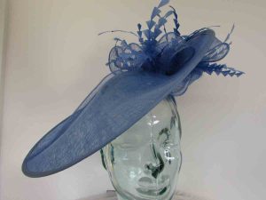 Large hatinator with diamante shaped feathers in bluebell
