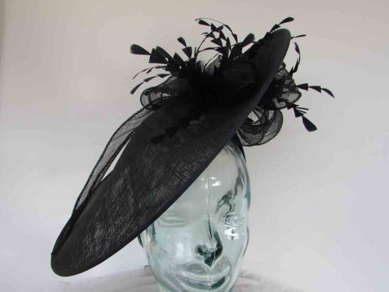 Large hatinator with diamante shaped feathers in navy