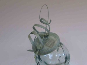 Pillbox fascinator with sinamay swirls in bermuda mint