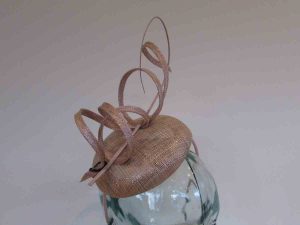 Pillbox fascinator with sinamay swirls in rose gold