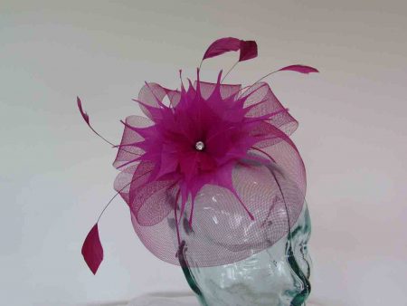 Crin fascinator with feathered flower in fuschine