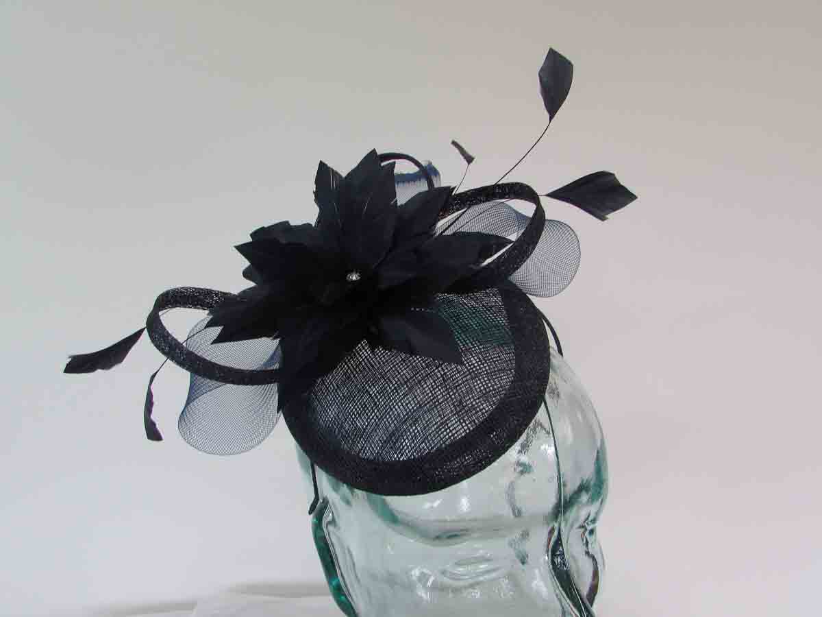 Pillbox fascinator with flower in navy