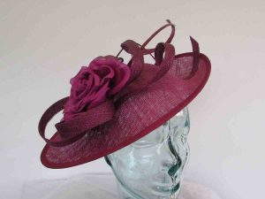 Oval hatinator with double quill in deep peony