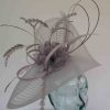 Pleated crin fascinator with feathered flowers in silver