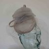 Pillbox fascinator with birdcage netting in pearl silver