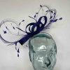 Sinamay looped fascinator with curled feathers in cobalt blue
