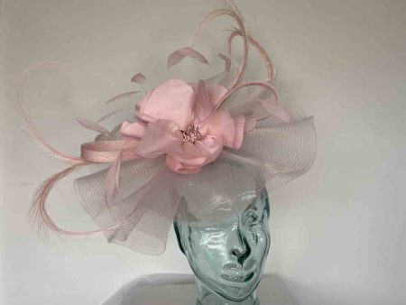 Stunning crin fascinator with flower in rose pink