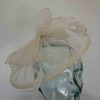 Sinamay fascinator with feathers in ivory
