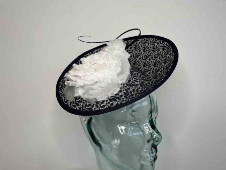 Oval hatinator with lace detail in navy and white