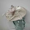 Oval hatinator with flower in oyster with a  silver lurex
