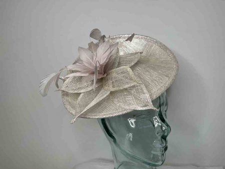 Oval hatinator with flower in oyster with a  silver lurex
