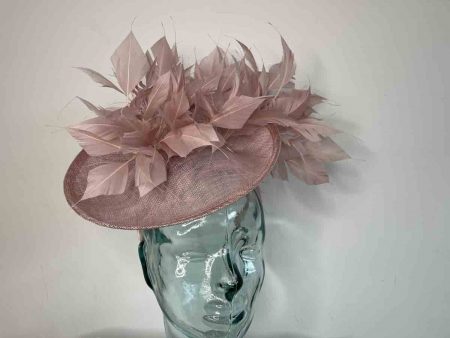 Hatinator with dramatic feather detail in crystal pink