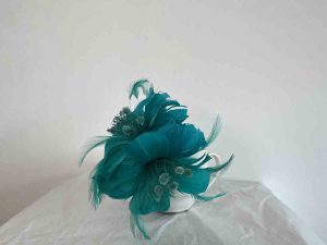 Feathered fascinator in teal