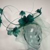 Five quill fascinator with flower detail in emerald