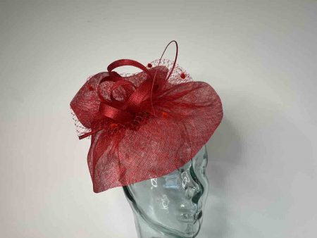 Sinamay fascinator with netting in carmine red