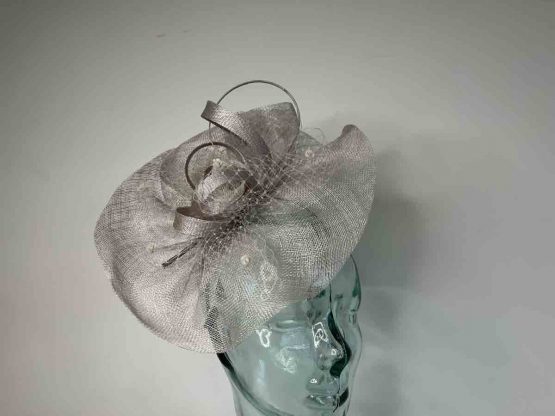 Sinamay fascinator with netting in dove