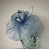 Sinamay fascinator with netting in vista