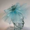 Crin fascinator with feather flower in baby blue