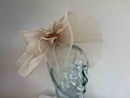 Crin fascinator with feather flower in champagne