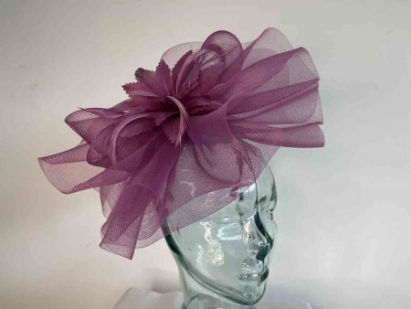 Crin fascinator with feather flower in fuschine