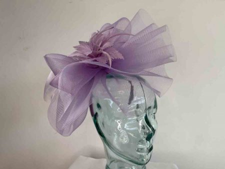 Crin fascinator with feather flower in lilac