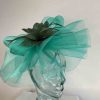 Crin fascinator with feather flower in summer green