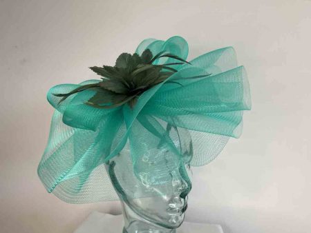 Crin fascinator with feather flower in summer green