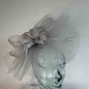 Crin fascinator with feather flower in silver