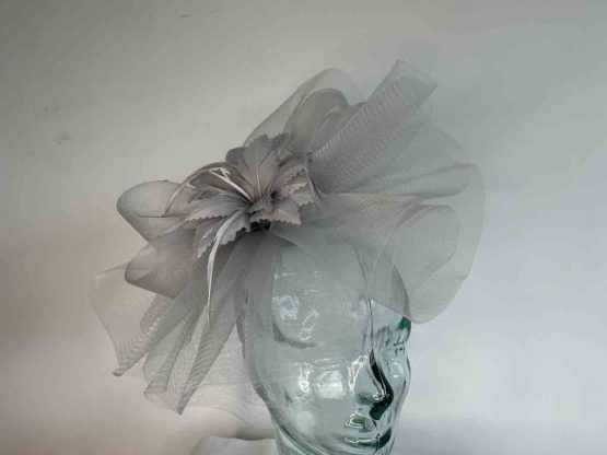 Crin fascinator with feather flower in silver