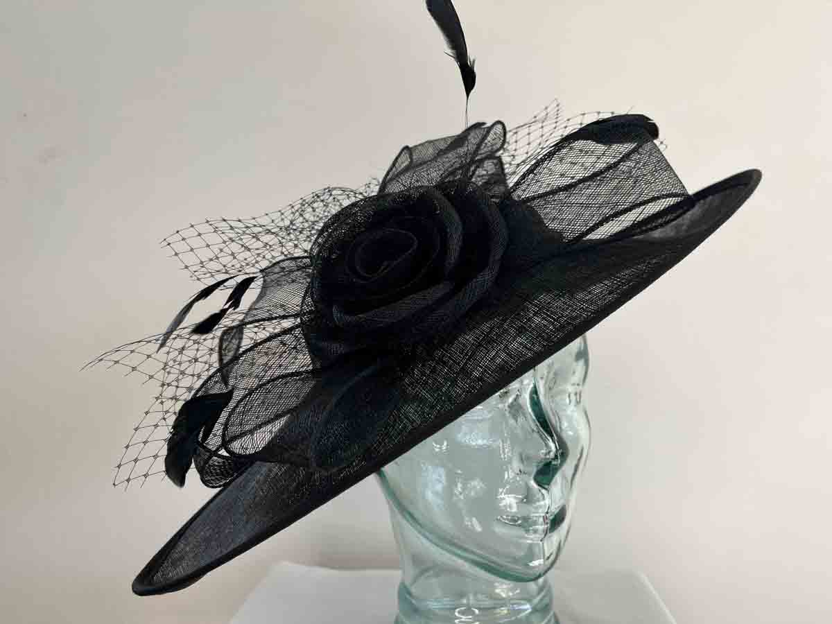 Large sinamay hatinator with sinamay rose in black